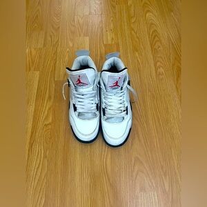 Jordan 4 size 8 in men’s grey black and white.
